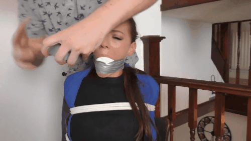 He Is Duct Taping Socks Into Her Mouth