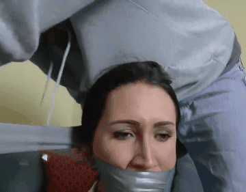 Helpless girl duct tape wrap gagged tight by intruder