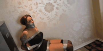 Chair Tied Brunette Gag Talks With A Big Fat Duct Tape Wrap Gag On Her Mouth