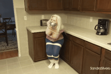 Helpless MILF Damsel In Distress Hops In The Kitchen