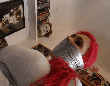 Squirming Redhead Tied Up In Horror House