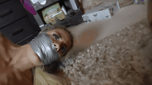 Naked Woman Duct Tape Gagged On The Floor