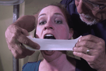 Taping Black Panties In Her Mouth With White Medical Tape