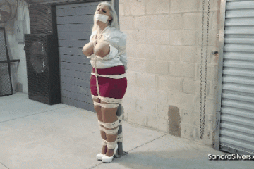 Pole Tied Blonde Tied Up In Storage Facility