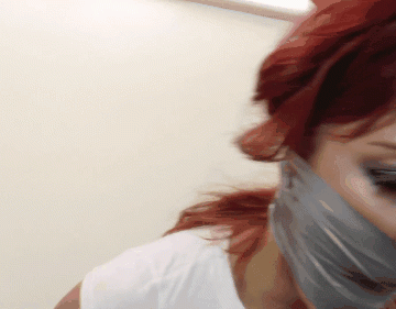 Just A Tightly Duct Tape Gagged Redhead With An Attitude