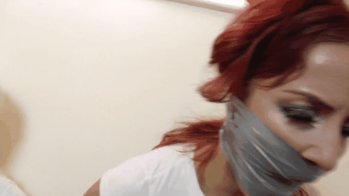 Just A Tightly Duct Tape Gagged Redhead With An Attitude