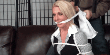 Blonde girl in bondage cleave gagged by intruder