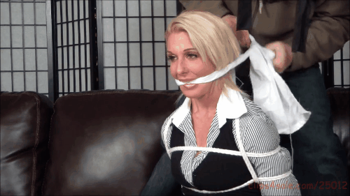 Blonde girl in bondage cleave gagged by intruder