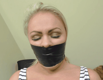 Gorgeous Blonde With A Tight Black Tape Gag