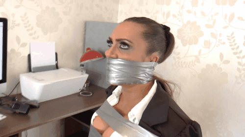 Duct Tape Bound Brunette Massively Wrap Gagged In The Office
