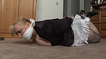 Hogtied maid over the mouth gagged on the floor