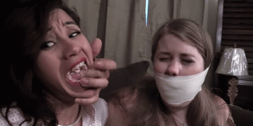 Tightly tape wrap gagged girl watches her roommate being gagged