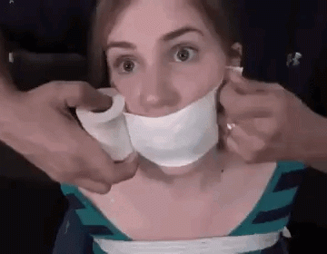 Whining girl has her mouth tape wrap gagged shut
